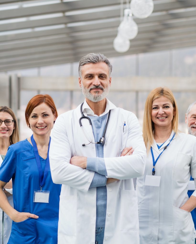 group-of-doctors-standing-in-hospital-on-medical-conference-.jpg